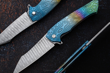 NÓŻ SKŁADANY FOLDER OVIUM GENERACJA 2 #0132 DAMASTEEL NEBULA RIPPLE HALF DRESS HERMAN KNIVES