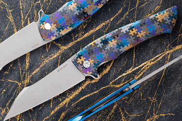 NÓŻ SKŁADANY FOLDER OVIUM #0077 MAGNACUT PUZZLE HERMAN KNIVES